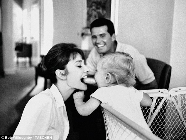 Behind-the-scenes: A new book features rarely seen candid photos of Audrey Hepburn from 1953 to 1966. (Pictured: Sean, Audrey