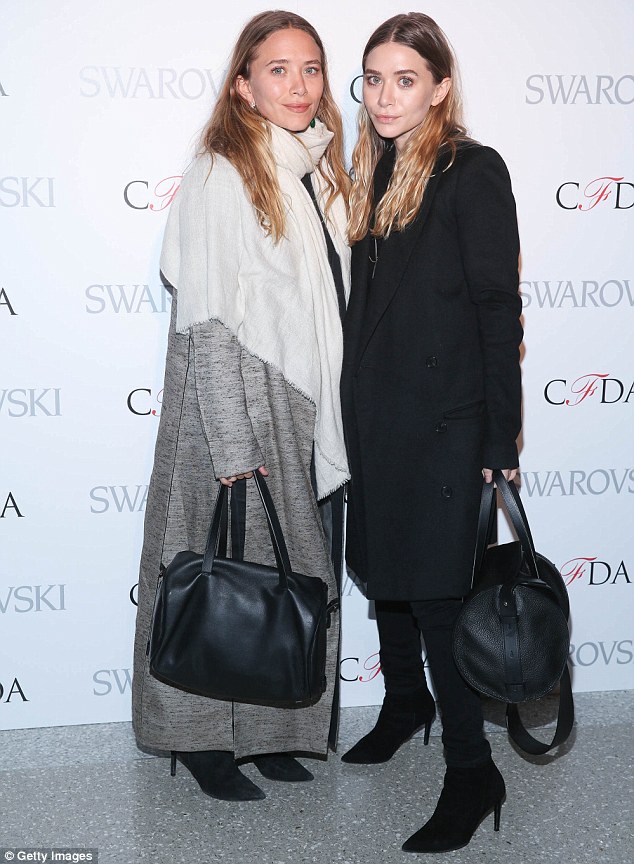 Modest moguls: Mary-Kate, left, and Ashley Olsen, right, opted to make humble appearances as they attended the 2015 CFDA Fashion Awards Announcement Party at The Weather Room at the Top of the Rock in New York City on Monday