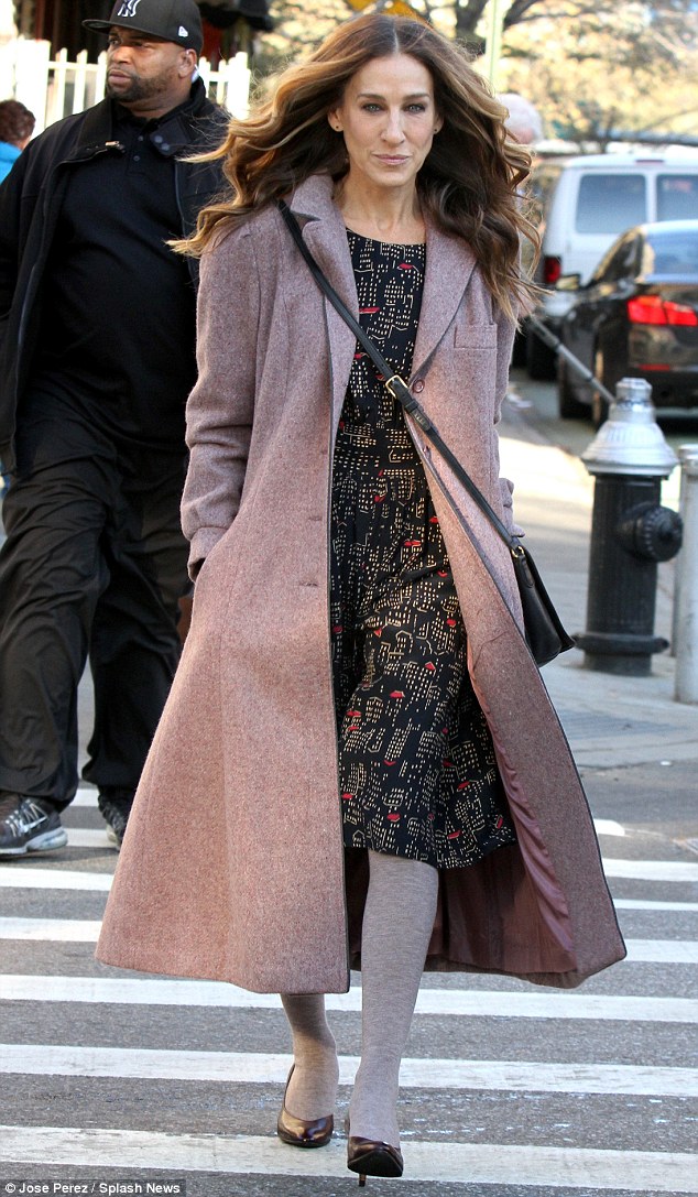 Uptown girl: Sarah Jessica Parker, 50,  wore a navy dress complete with white and red printed detailing