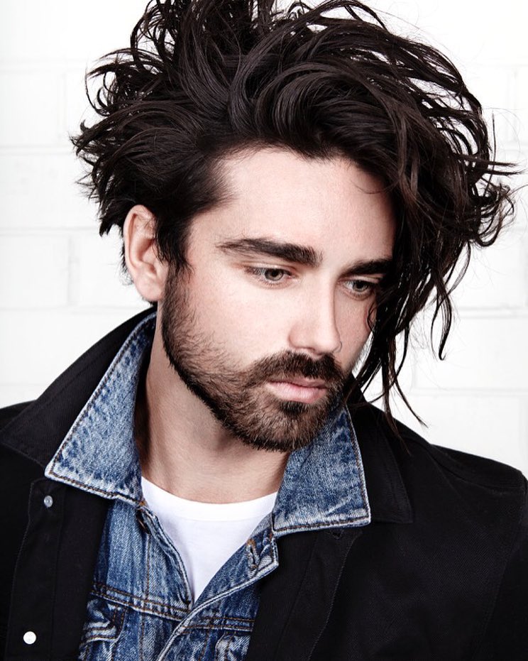 Long curly messy hairstyle for men